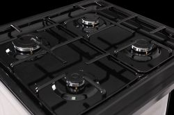 Плита газова PRIME Technics PSG 54002 B, Black/Grey, поворотні перемикачі, 4 газові конфорки, решітка металева емальована, підсвітка духовки, термометр, 50x60x85см - Картинка 9